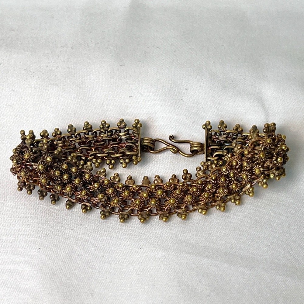 Antique Gold Tone Filigree Mesh Bracelet with Floral Motif and Hook Clasp